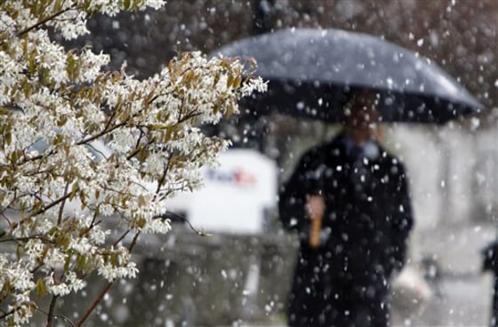 Snow falls in Montpelier, Vt., on Tuesday. Up to a foot of snow was expected at higher elevations.